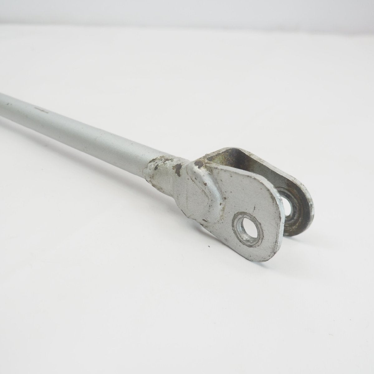 Genuine Rear Brake Torque Rod – Suzuki RGV250 Gamma VJ21A (1988–1989) | PN: 64300-12852