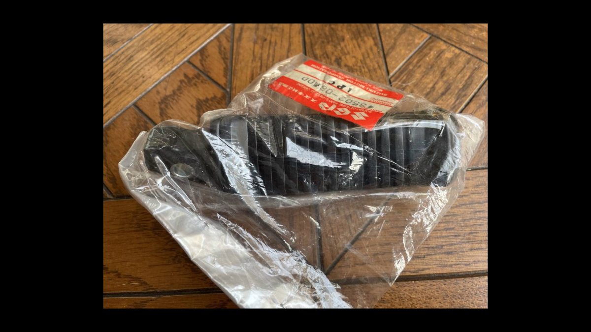 Suzuki GSX750S3(4) Katana Genuine Front Left Footrest Assembly – NOS